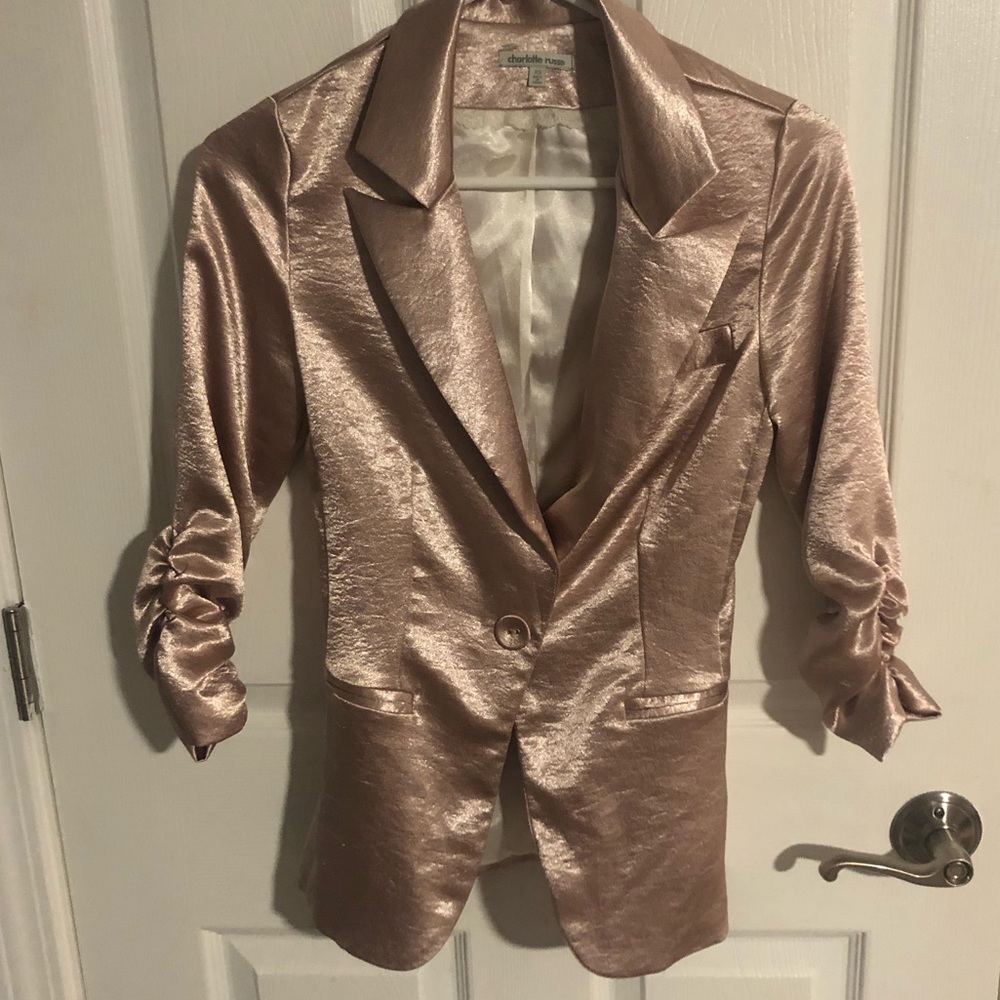 Light pink shimmer sport coat.